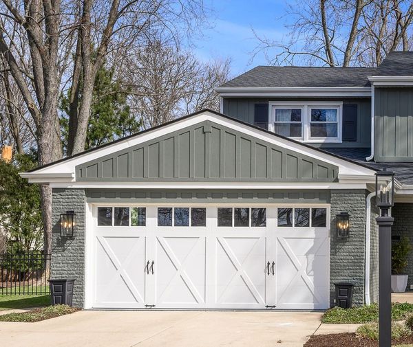 New carriage-house style garage door installed on an Elmhurst IL home by Preferred Garage Door Repair Company